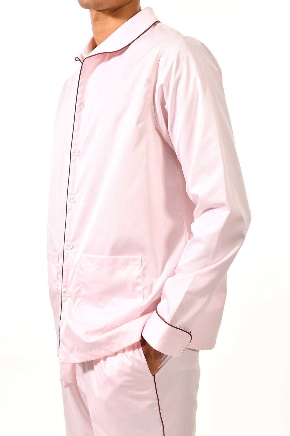 The Waldorf in light pink cotton broadcloth with burgundy piping