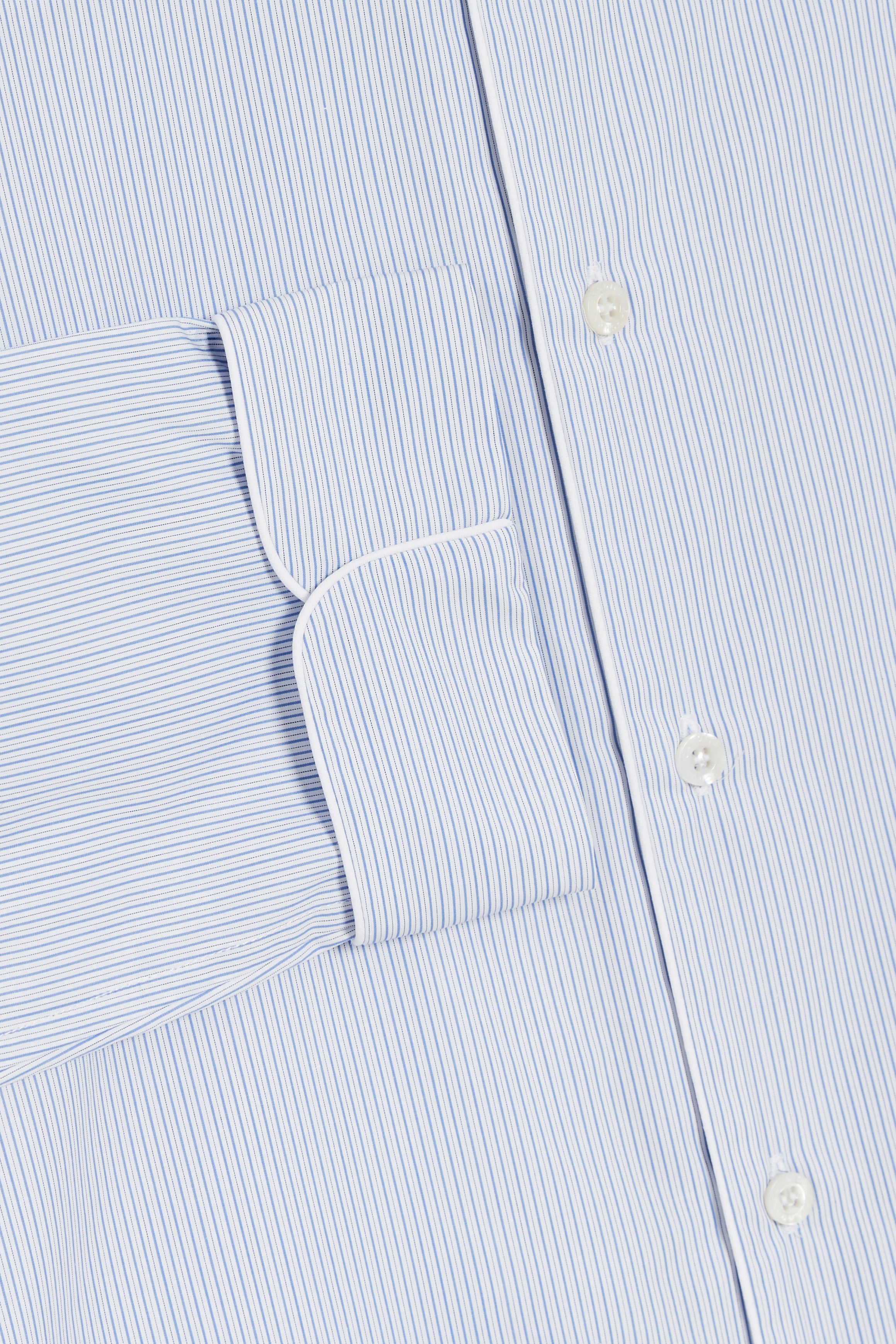 The Waldorf in white cotton broadcloth with thin blue stripes
