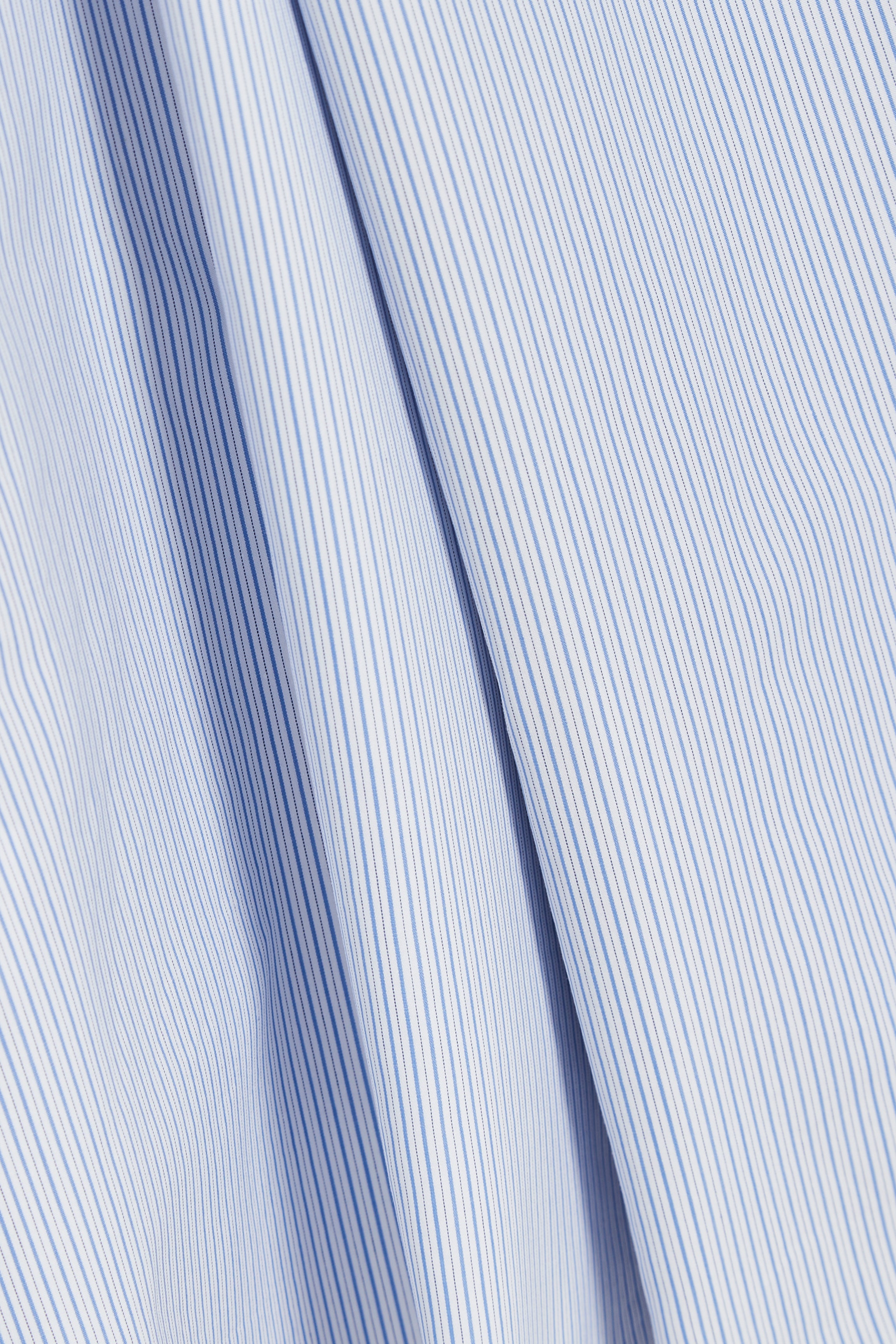 The Waldorf in white cotton broadcloth with thin blue stripes