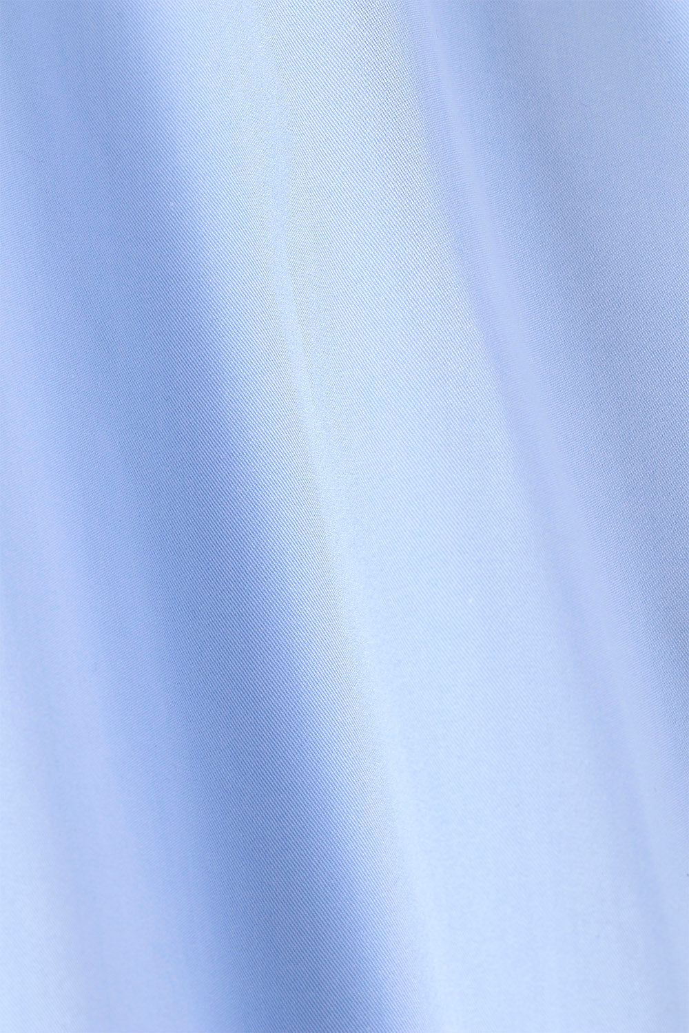 Le Waldorf en popeline de coton bleu ciel passepoil vert bouteille